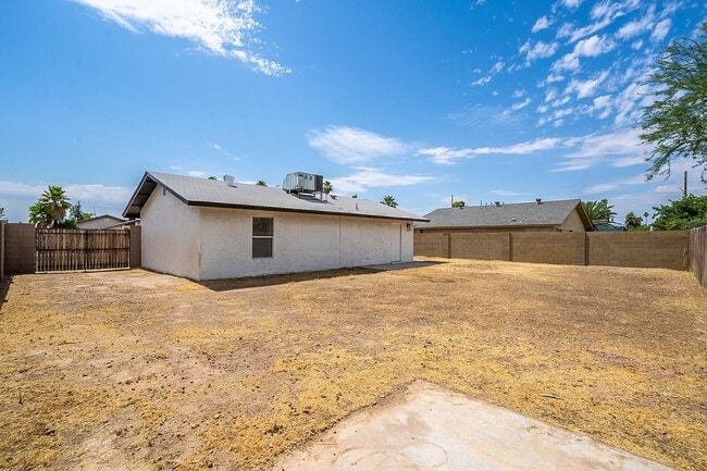 Building Photo - Updated home with large backyard & 2 car g...