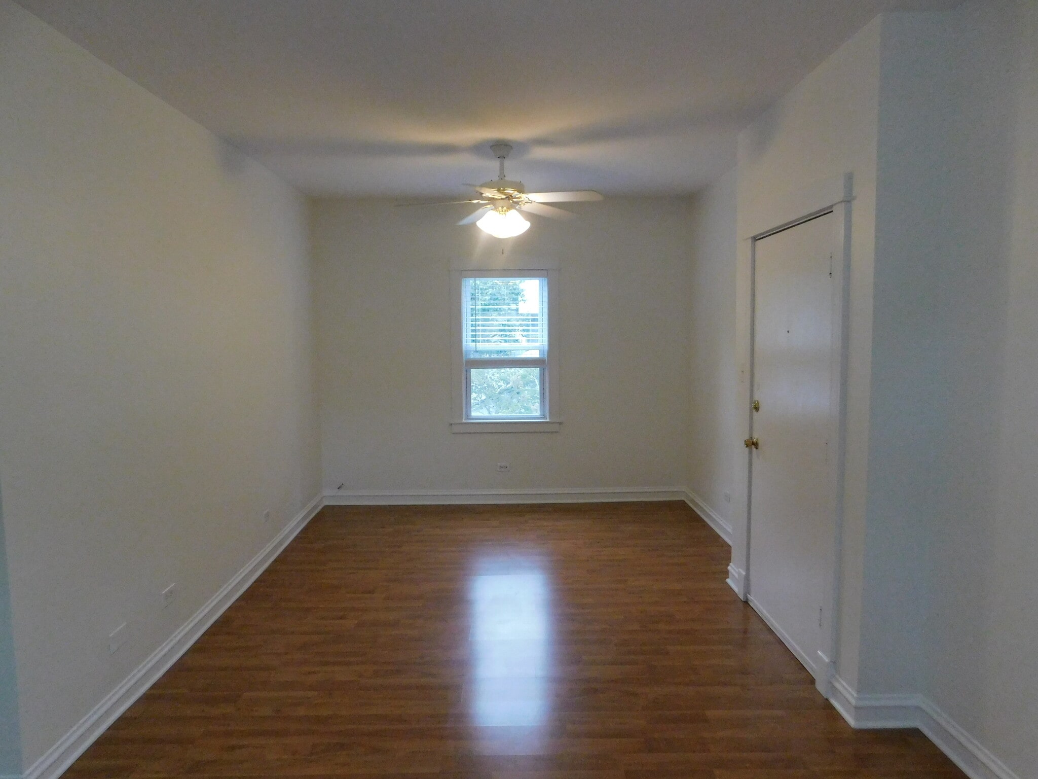 North view of family room. New flooring being installed. - 1566 Dewey Ave