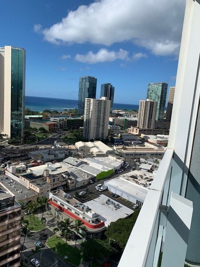 Building Photo - Moana Pacific - 2 bedroom plus den, 2 bath Condo with 2 parking - avail now!