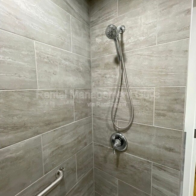 Building Photo - 8229 Halifax Ct N