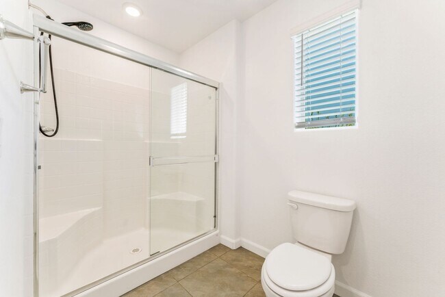 Building Photo - Modern Gated Townhome Living with Resort-Style Community Amenities