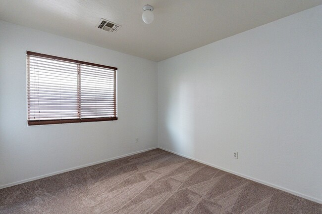 Building Photo - Three bedrooms! Fresh Carpet and Paint!