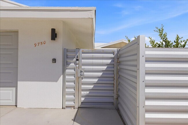 Building Photo - 3 bed / 2 Bath Mid-Century Home with Two-Car Garage, Soaking Pool and Manicured Backyard!