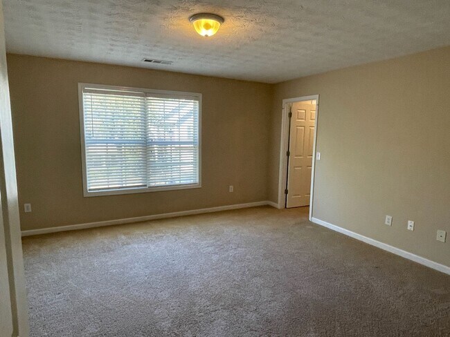 Building Photo - Relax in your spacious home deep in the Watson Grove subdivision