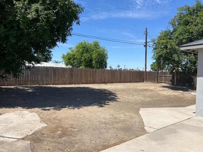 Building Photo - Remodeled 3 Bed Home w/ Fireplace, Garage & Huge Backyard – 93309