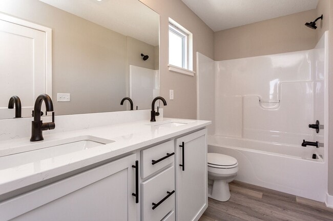 Building Photo - Spacious 4-Bedroom Home with 2-Car Garage & Yard