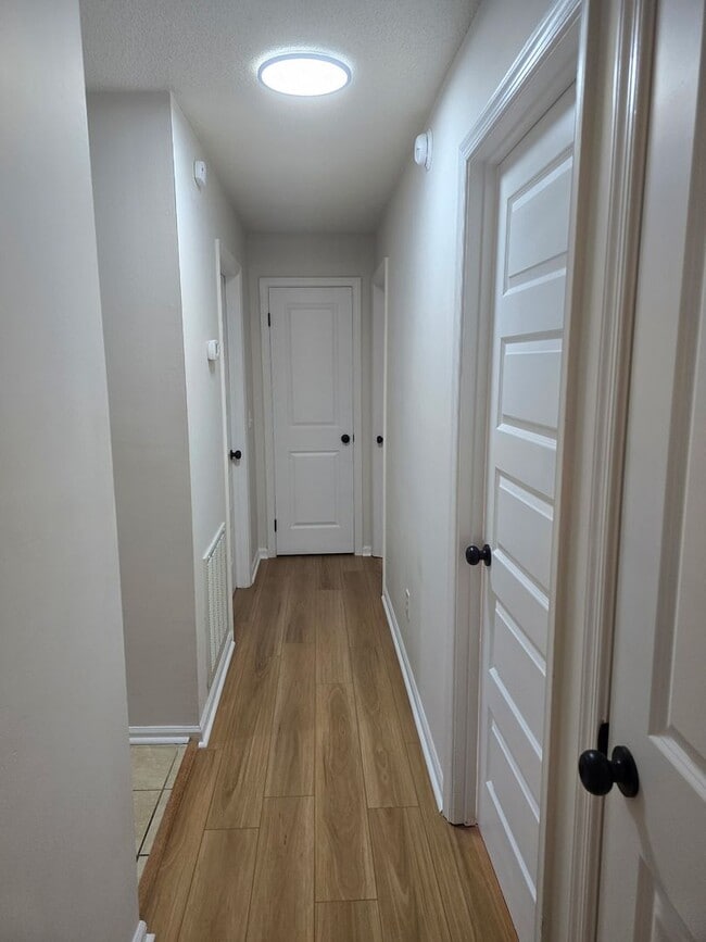 Building Photo - Renovated Home 3 bedroom 1.5 bath with new privacy wooden fence