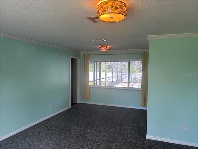 Building Photo - 10845 Del Prado Dr E