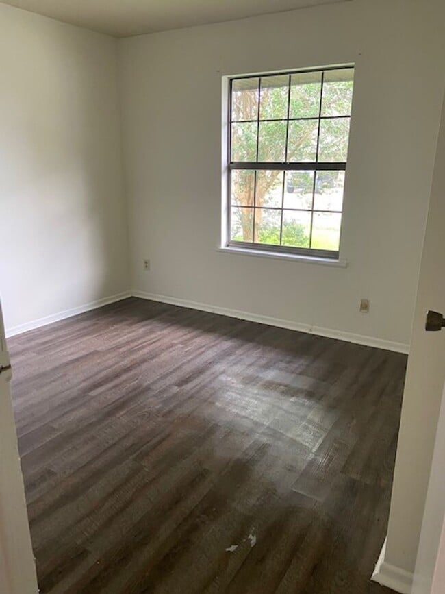 Building Photo - Nature in the Heart of the City: Live Near Moncus Park-2 BED 1 BATH