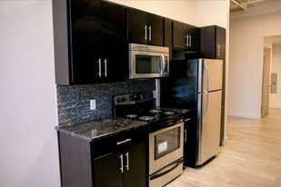 Building Photo - The Lofts at Clifford Brown Walk