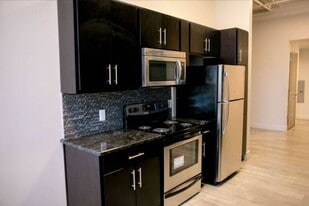 Building Photo - The Lofts at Clifford Brown Walk