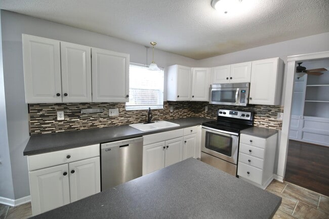 Building Photo - 4400 Greensbury Dr