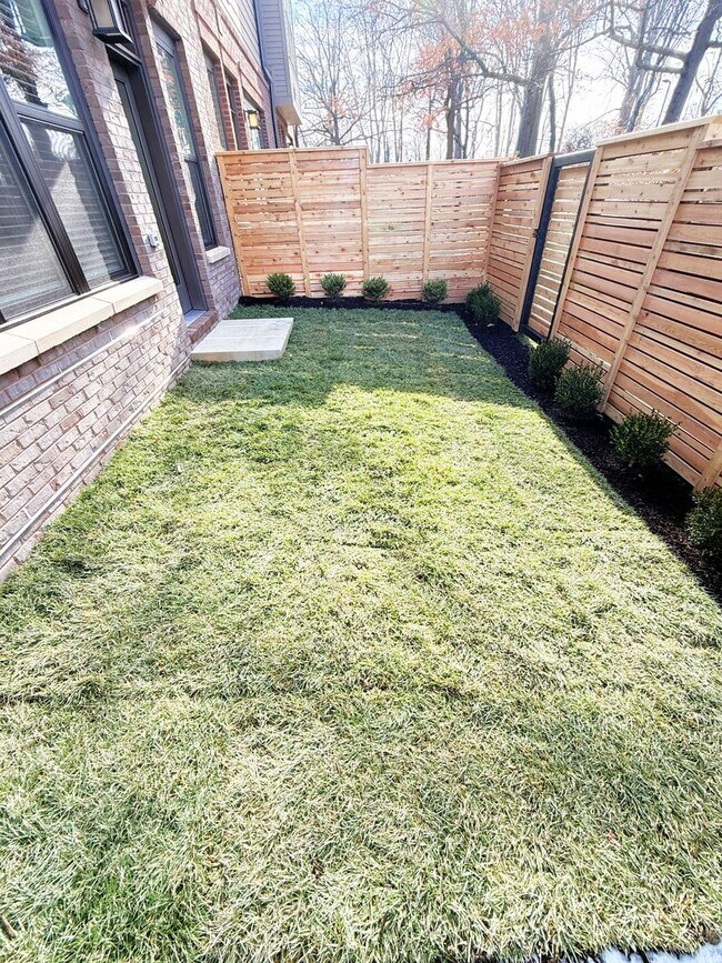 Building Photo - Brand new 4 level, 4 Bedroom Townhome with Elevator!