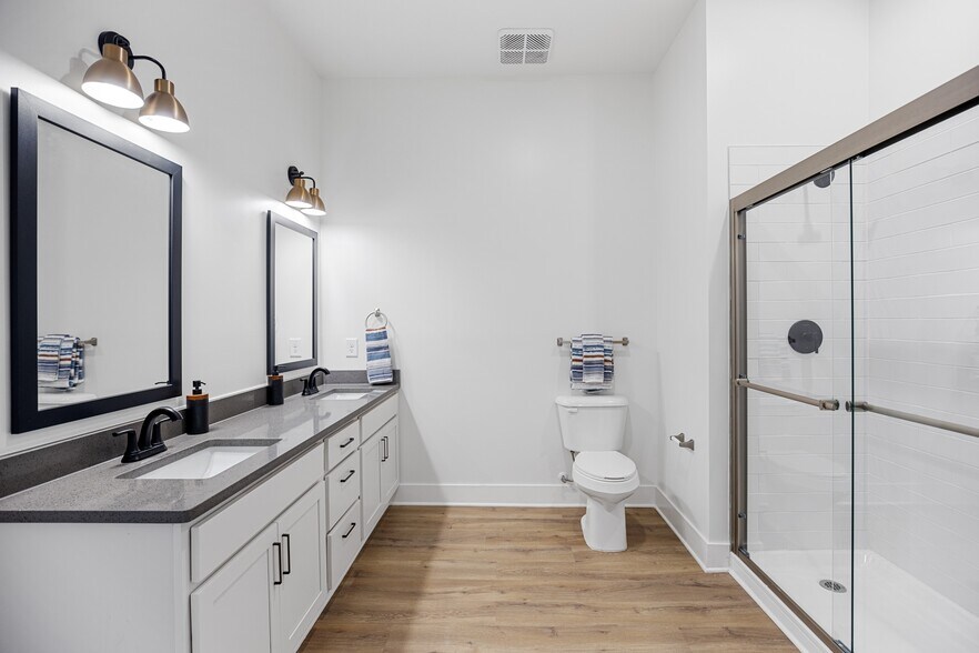 Spa inspired bathroom with walk-in shower - Oak Grove at Blake Farm