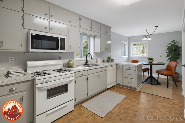 Building Photo - Modest East Asheville 3-Bedroom with Garage & Fenced-In Backyard