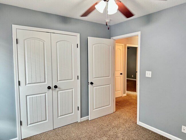 Building Photo - Large Open 4 Bedroom Home with Bonus! Tree Lined Backyard with Privacy Fence!