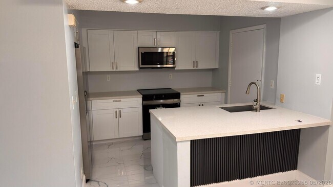 Building Photo - 9150 NW 38th Dr