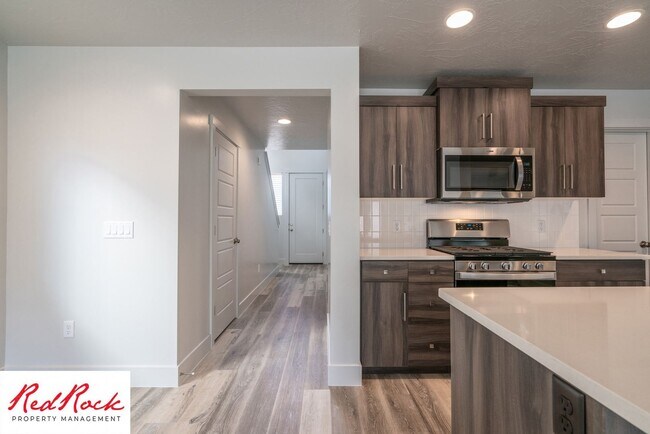 Building Photo - Innovative Design! 4 Bedroom Home in the Beautiful Desert Playa Community