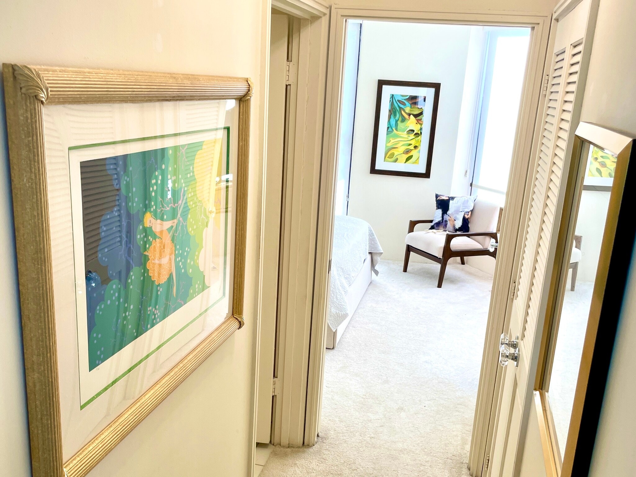 Hallway gallery to bathroom and large bedroom with flat screen TV and small lanai - 1221 Victoria St