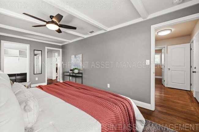 Building Photo - Welcome to this stunning 4-bedroom, 2-bath...