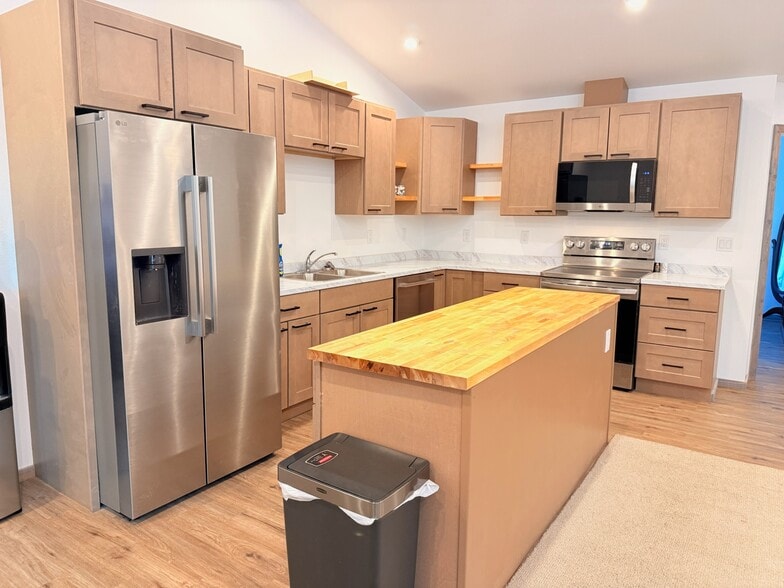 Kitchen with Kitchen Island and ample storage - 2567 Old Mission Rd
