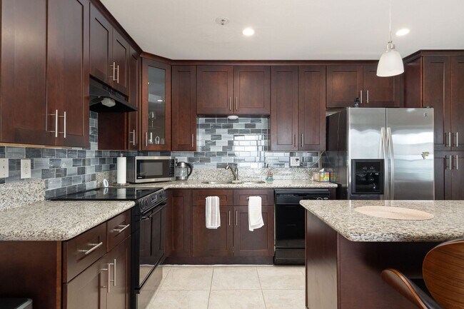 Building Photo - Oceanfront 2 bedroom condo available, full...
