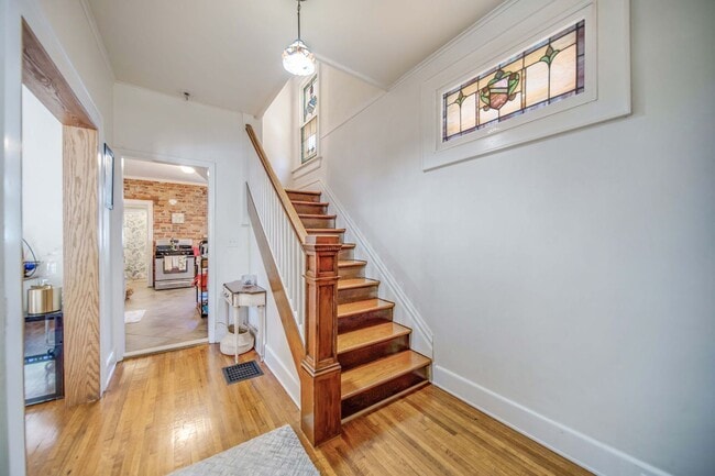 Building Photo - Charming 5-Bedroom Home with Exposed Brick and Modern Upgrades