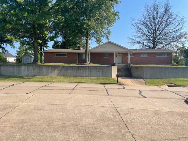 All brick home with side entry two car garage and plenty of parking - 302 Coronation Dr