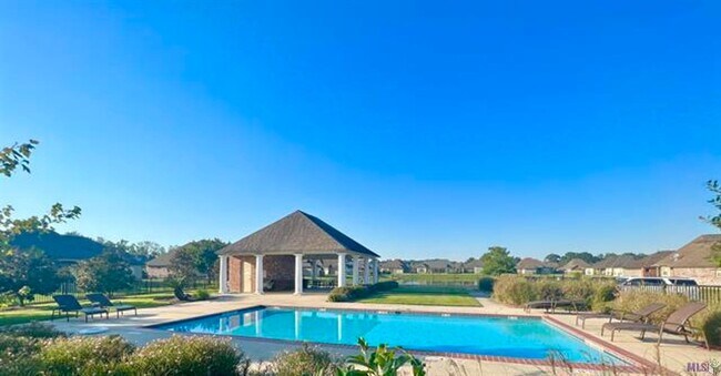 Building Photo - Beautifully Furnished 4-Bedroom Home in Zachary's Audubon Lakes!