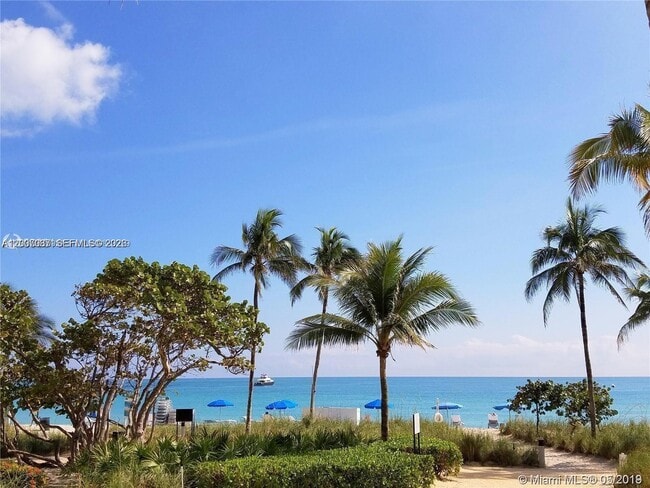 Building Photo - 10275 Collins Ave
