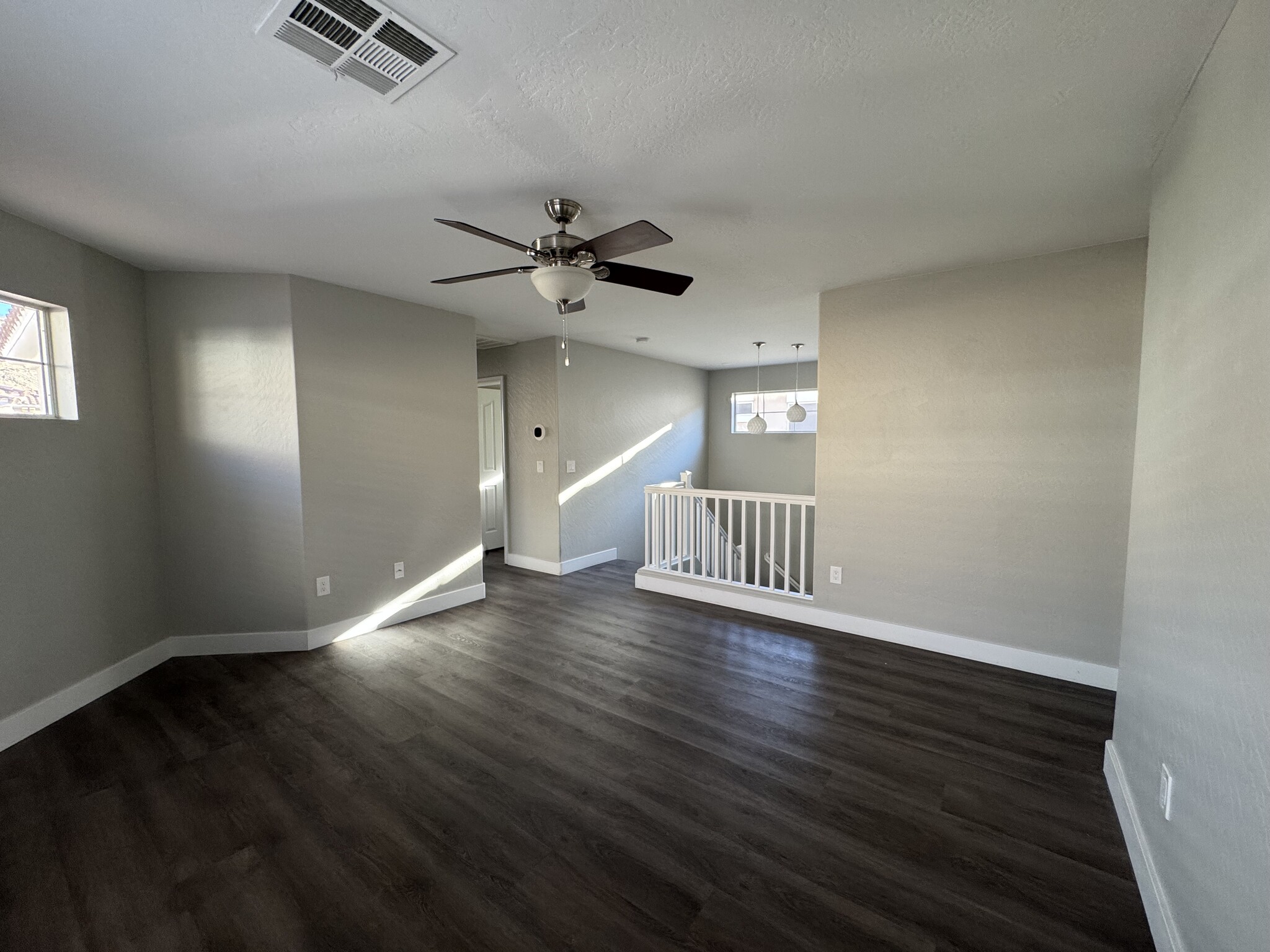 Loft Towards Stair and Hall to Bedrooms 1 & 2 - 524 W Mountain Sage Dr