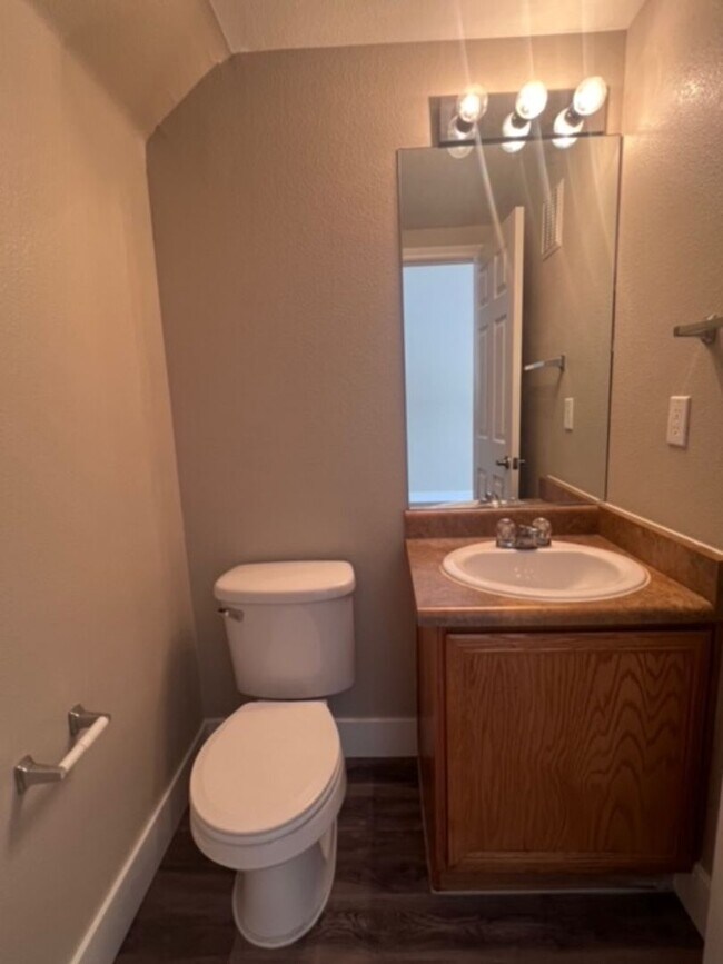 Building Photo - Three bedroom townhouse with 2 car garage