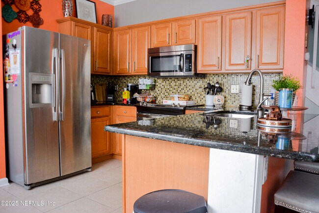 Building Photo - 7450 Scarlet Ibis Ln