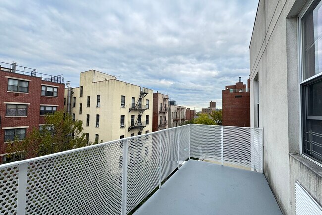 Building Photo - 51 E 128th St
