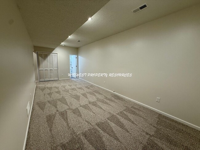 Building Photo - Spacious 3 Bedroom Home with Finished Basement, Covered Deck & Fenced Yard