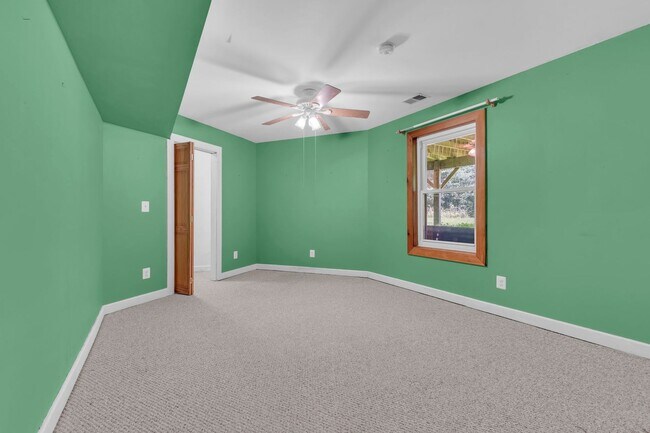Building Photo - One-of-a-Kind 4 BR Retreat on Nearly 13 Pr...