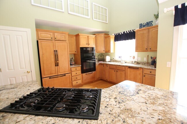Building Photo - Discover the allure of year-round living i...