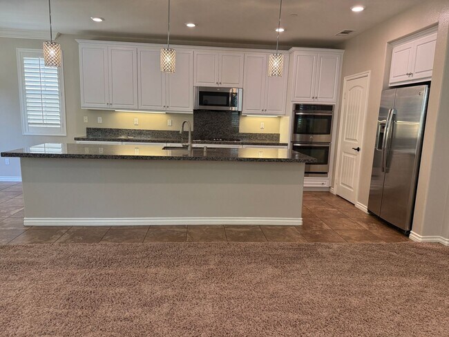 Building Photo - Stunning 4-Bedroom Home with Solar, EV Charger, and a Loft in Valencia