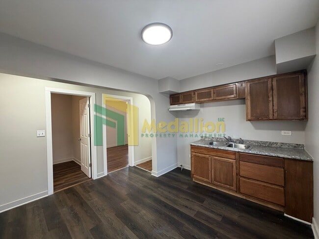 Building Photo - Updated 4-Bedroom Brick Ranch with Side Drive and Yard