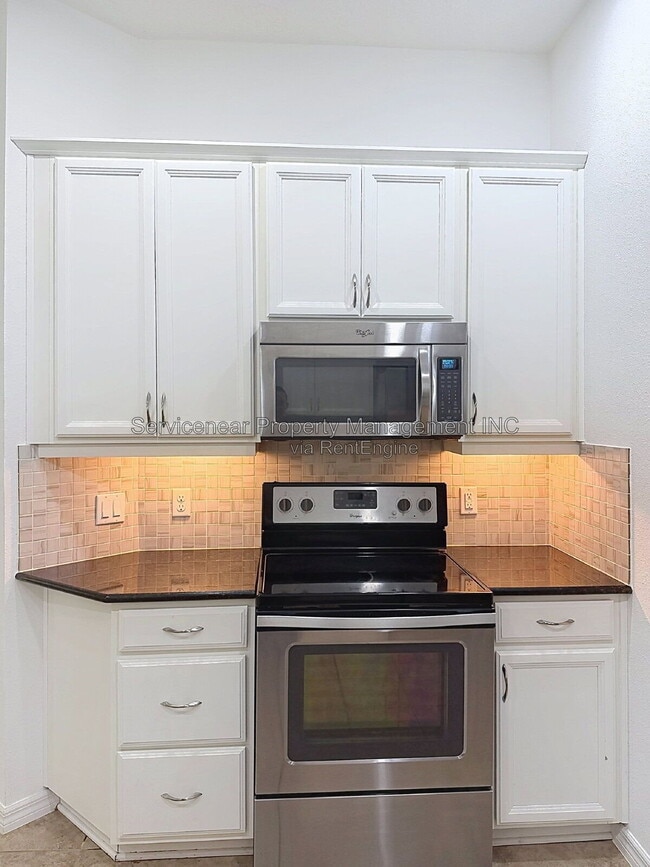 Building Photo - 9428 Woodcrane Dr