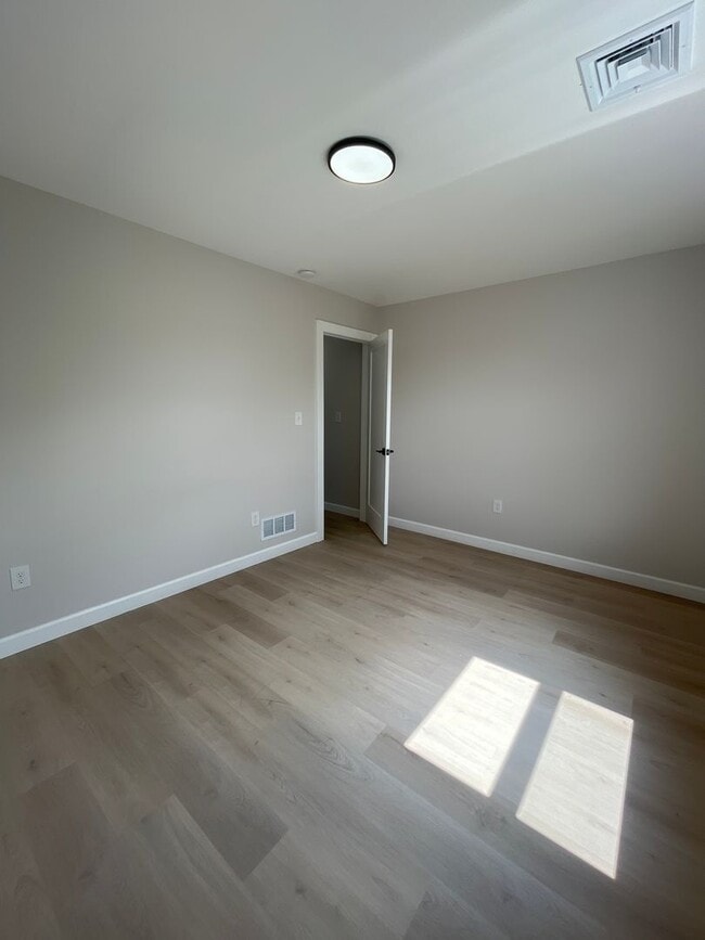 Building Photo - A real stunner! The full renovation is the first thing you'll notice..