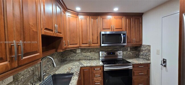 Building Photo - 10777 W Sample Rd