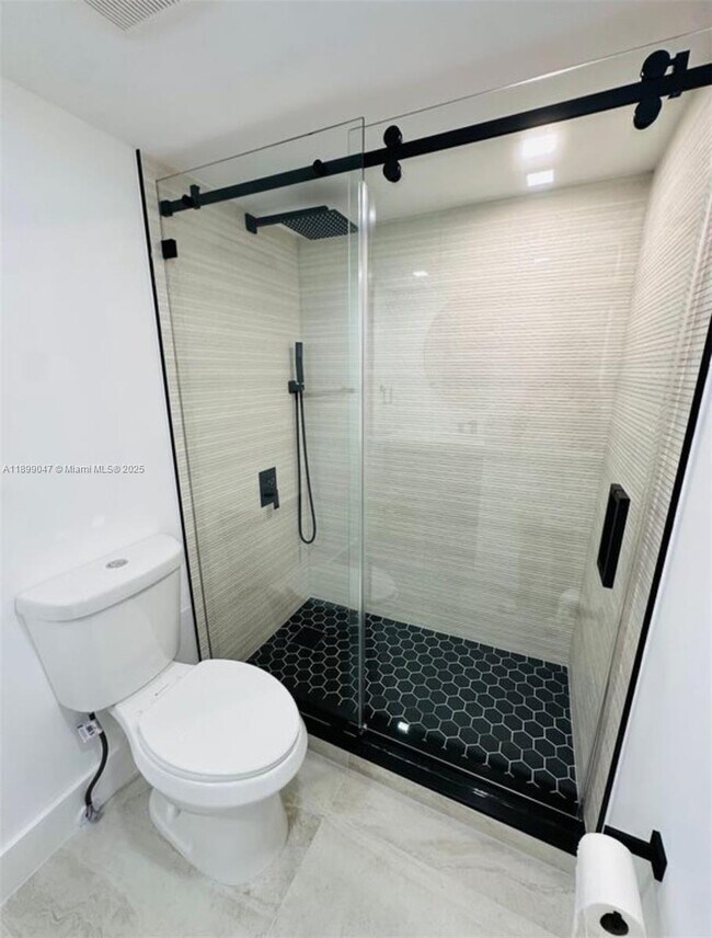 Building Photo - 5838 Collins Ave