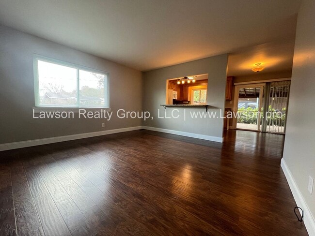 Building Photo - One Level Living- Beautifully Landscaped Yard and Attached Carport