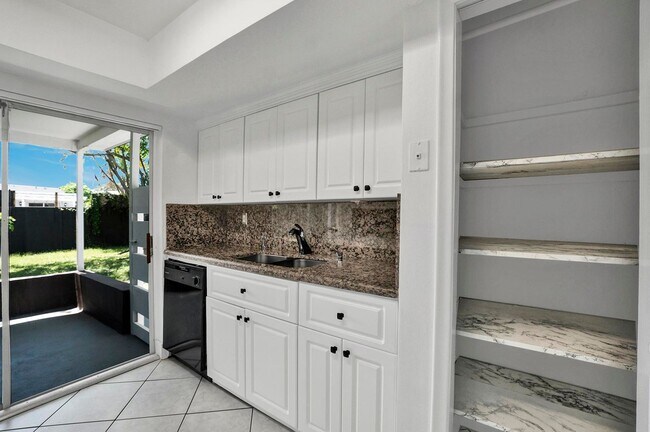 Building Photo - Sunrise Gem: Updated 2-Bed, 2-Bath with Garage Parking