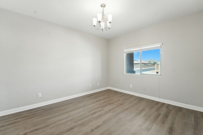 Building Photo - Welcome to this stunning 3-bedroom, 2-bath...
