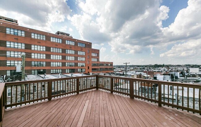 Building Photo - Charming 2bdrm 2.5 bath Patterson Park home with parking and rooftop deck