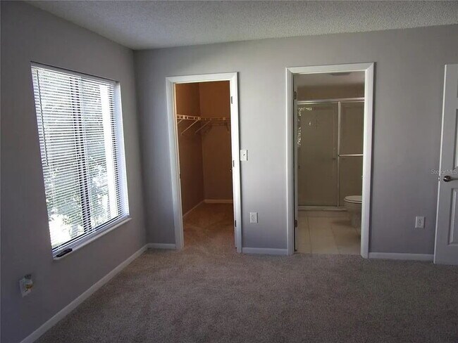 Building Photo - 2-Bed, 2-Bath Condo Retreat in Serene Tarpon Springs Oasis!