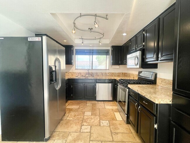 Building Photo - AVAILABLE NOW!! 3 Bedroom/2 Bathroom Cathedral City Pool Home!!  MOVE IN SPECIAL HALF OFF ONE MON...