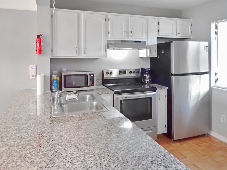 Upgraded kitchen, new granite countertop, stainless steel appliances. - 3601 Saint Johns Ct